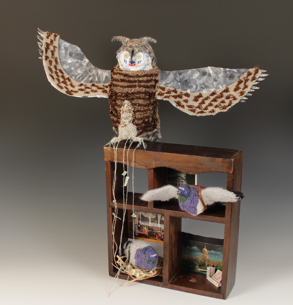 sculptural allegory about money in politics with owl, pigeons, vintage postcards of state capitols