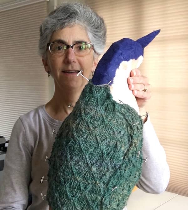 Calm, green heron knitted sculpture in progress showing section pinned to armature © 2020 Eve Jacobs-Carnahan