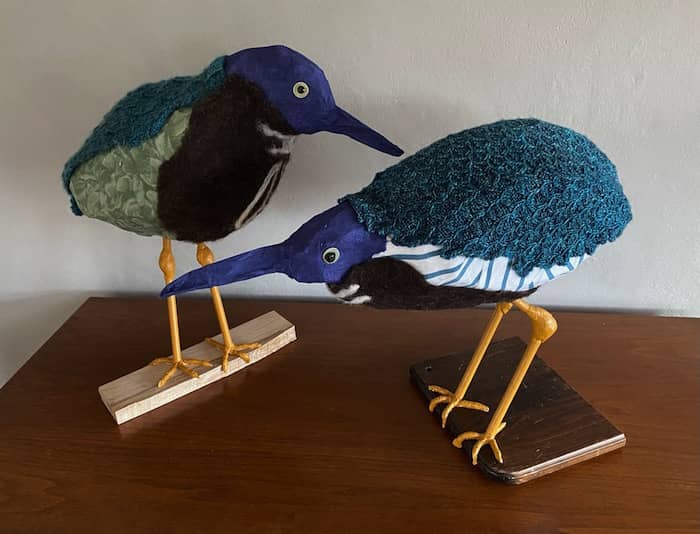 2 fiberart bird sculptures with knitted backs, brown felted breasts, orange legs, green herons by Eve Jacobs-Carnahan ©2021